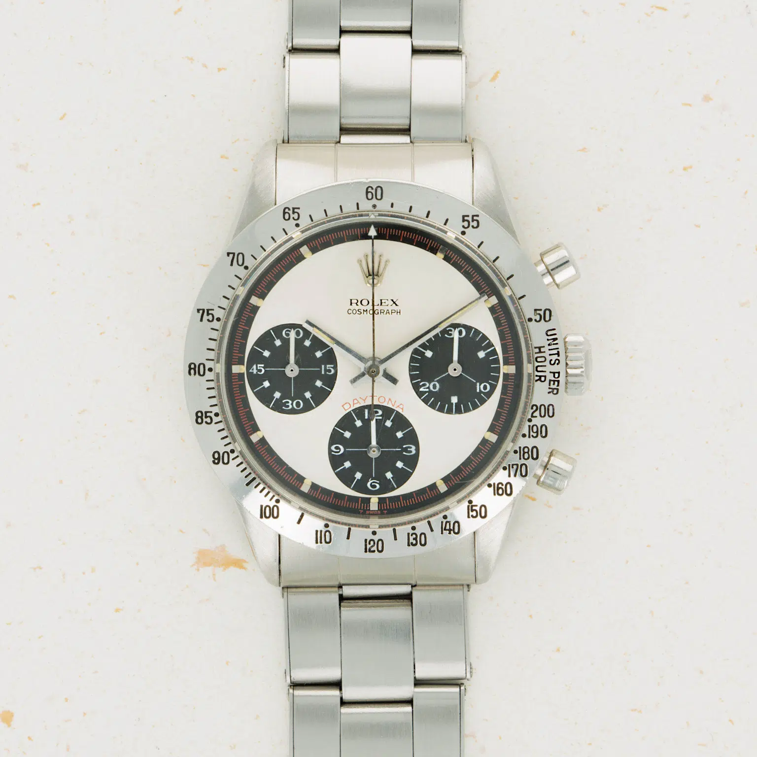 Vintage Rolex Daytona 6239 Paul Newman with distinctive tri-color dial and tachymeter bezel, iconic in racing and collectible watch culture