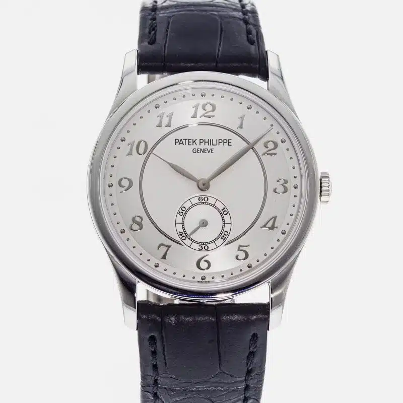 Patek Philippe Calatrava white gold watch with silver dial, Breguet numerals, and black leather strap